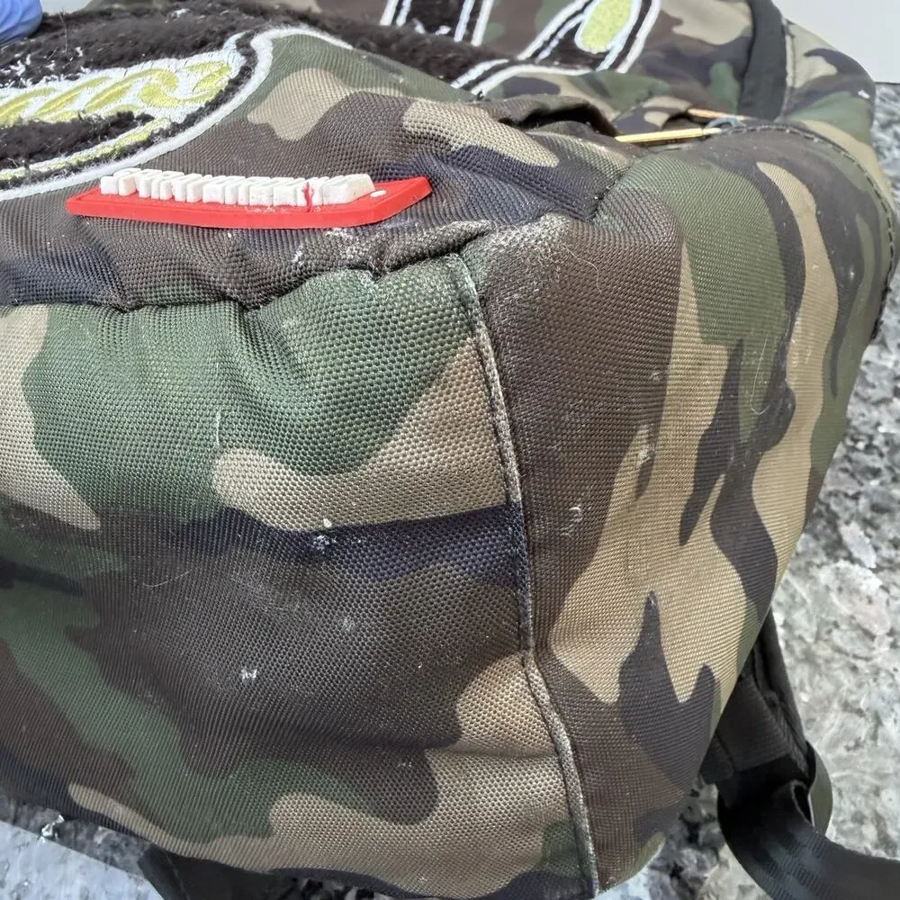 Sprayground Camouflage Backpack with Peace Sign Patch